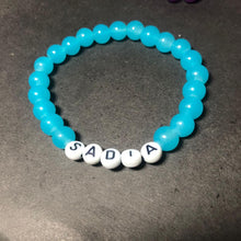 Customized color name bracelet in vibrant blue